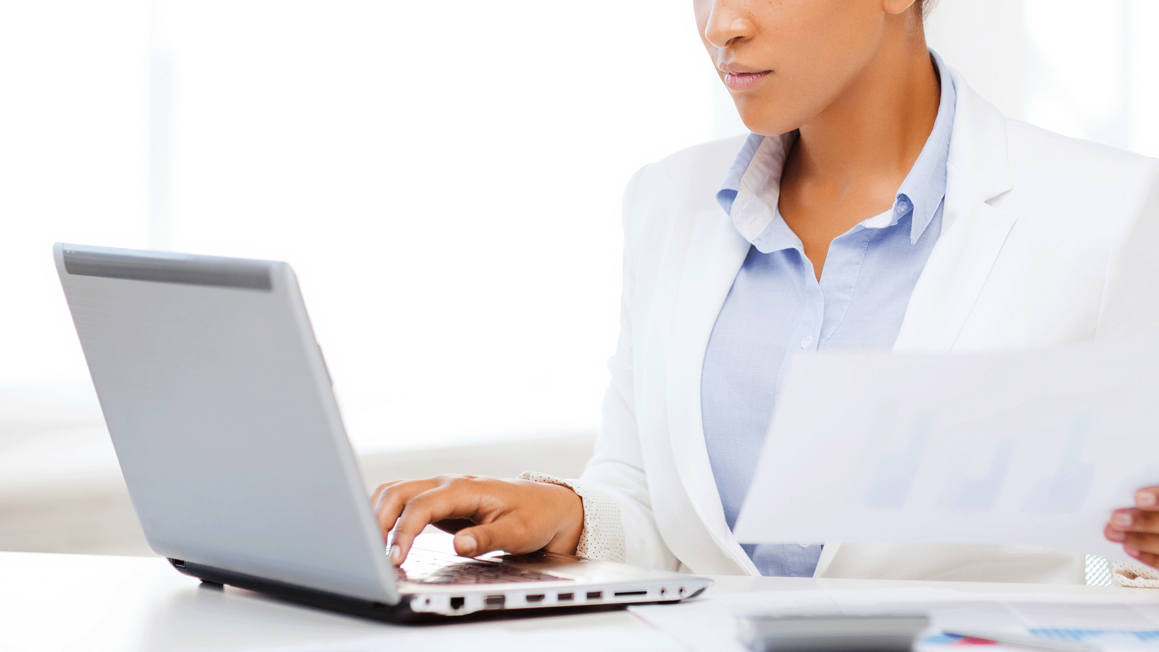 Woman entering information in online form.