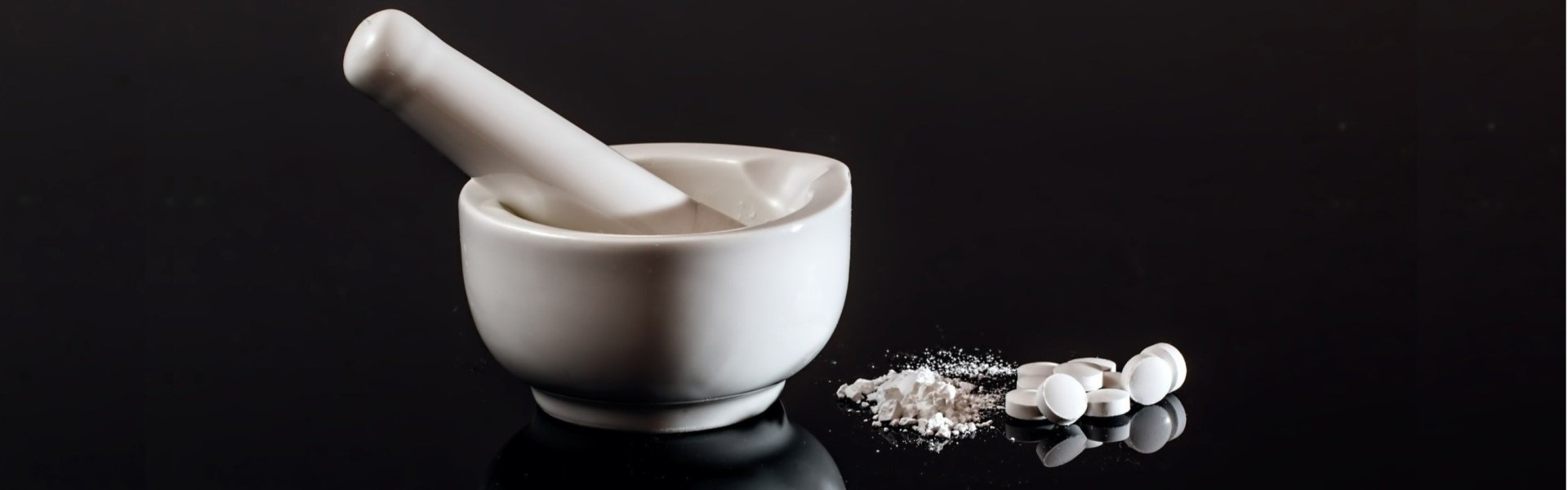 Picture of mortar and pestle with crushed tablets